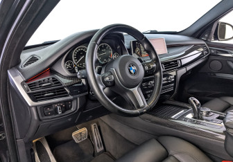 Подержанный автомобиль BMW X5 2015 года (15 фото)