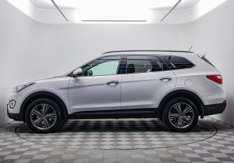 Подержанный автомобиль Hyundai Santa Fe 2014 года (2 фото)