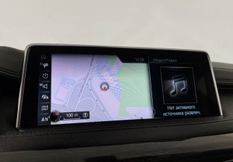 Подержанный автомобиль BMW X6 2016 года (21 фото)