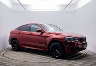 Подержанный автомобиль BMW X6 2015 года (7 фото)