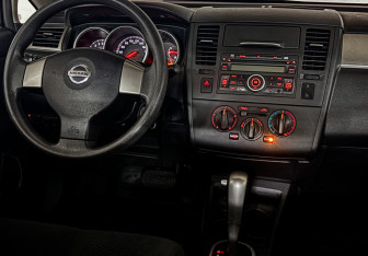 Подержанный автомобиль Nissan Tiida Sedan 2013 года (16 фото)