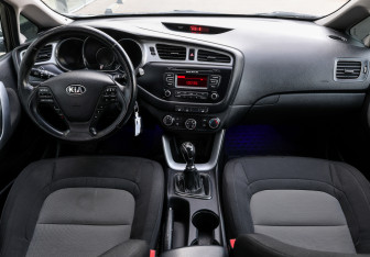 Подержанный автомобиль Kia Ceed Wagon 2014 года (13 фото)