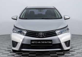 Подержанный автомобиль Toyota Corolla Sedan 2013 года (2 фото)