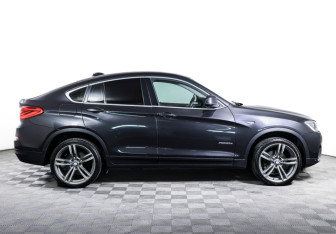 Подержанный автомобиль BMW X4 2015 года (4 фото)