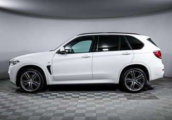 Подержанный автомобиль BMW X5 2015 года (8 фото)