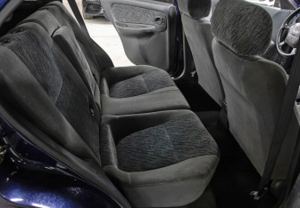 Подержанный автомобиль Nissan Almera Hatchback 1997 года (7 фото)