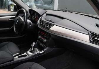 Подержанный автомобиль BMW X1 2014 года (7 фото)