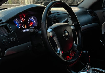 Подержанный автомобиль Chevrolet Epica 2010 года (13 фото)