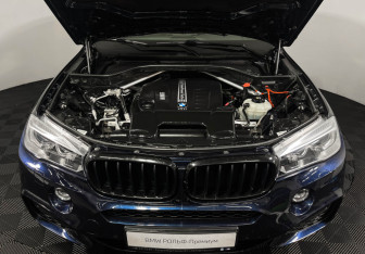 Подержанный автомобиль BMW X6 2018 года (10 фото)