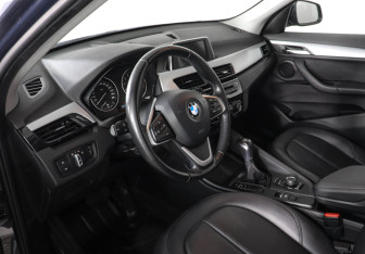 Подержанный автомобиль BMW X1 2016 года (12 фото)
