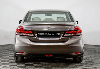 Подержанный автомобиль Honda Civic Sedan 2013 года (4 фото)