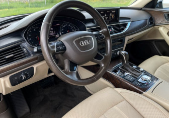 Подержанный автомобиль Audi A6 Sedan 2016 года (13 фото)