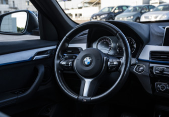 Подержанный автомобиль BMW X1 2019 года (10 фото)