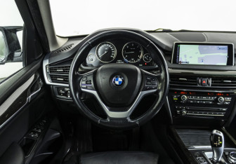 Подержанный автомобиль BMW X5 2014 года (11 фото)