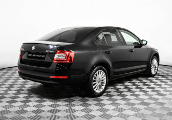 Подержанный автомобиль Skoda Octavia Liftback 2014 года (5 фото)
