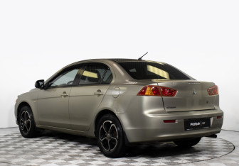Подержанный автомобиль Mitsubishi Lancer Sedan 2008 года (7 фото)