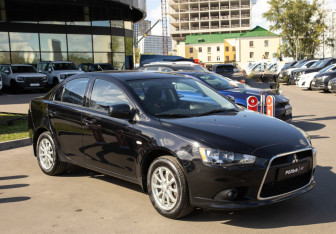 Подержанный автомобиль Mitsubishi Lancer Sedan 2014 года (2 фото)