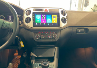 Подержанный автомобиль Volkswagen Tiguan 2010 года (15 фото)