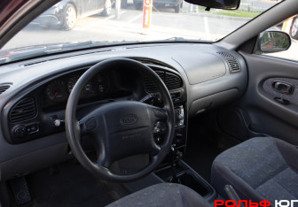 Подержанный автомобиль Kia Spectra Sedan 2006 года (10 фото)