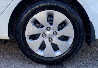 Подержанный автомобиль Kia Rio Sedan 2016 года (19 фото)