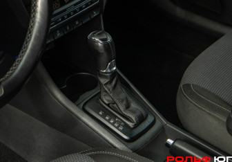 Подержанный автомобиль Skoda Rapid Liftback 2014 года (13 фото)