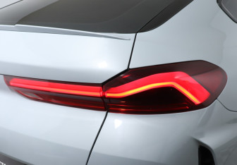 Подержанный автомобиль BMW X6 2024 года (23 фото)