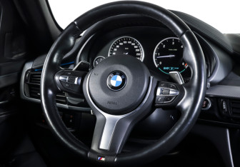 Подержанный автомобиль BMW X6 2018 года (14 фото)