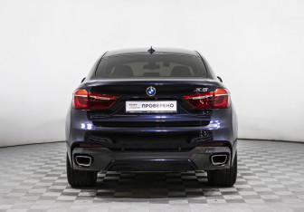 Подержанный автомобиль BMW X6 2015 года (6 фото)