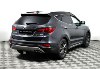 Подержанный автомобиль Hyundai Santa Fe 2016 года (3 фото)