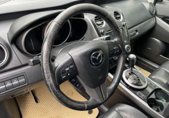 Подержанный автомобиль Mazda CX-7 2011 года (13 фото)