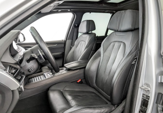 Подержанный автомобиль BMW X5 2014 года (20 фото)