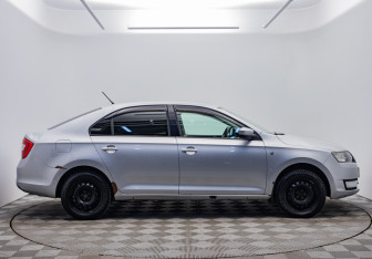 Подержанный автомобиль Skoda Rapid Liftback 2014 года (6 фото)