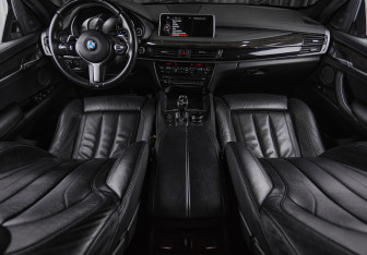 Подержанный автомобиль BMW X6 2014 года (24 фото)