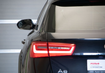 Подержанный автомобиль Audi A6 allroad 2014 года (39 фото)