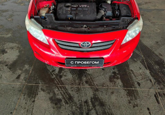 Подержанный автомобиль Toyota Corolla Sedan 2008 года (14 фото)