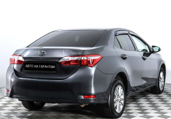 Подержанный автомобиль Toyota Corolla Sedan 2014 года (3 фото)