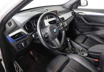 Подержанный автомобиль BMW X1 2018 года (12 фото)
