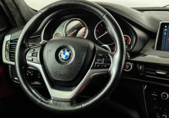 Подержанный автомобиль BMW X6 2018 года (15 фото)