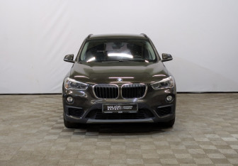 Подержанный автомобиль BMW X1 2018 года (2 фото)
