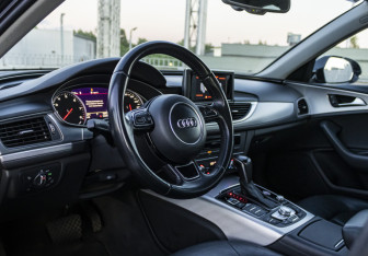 Подержанный автомобиль Audi A6 Sedan 2014 года (9 фото)