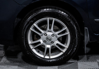 Подержанный автомобиль Nissan Note 2007 года (14 фото)