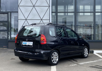 Подержанный автомобиль Mitsubishi Space Star Compactvan 2004 года (5 фото)