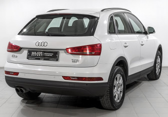 Подержанный автомобиль Audi Q3 2015 года (5 фото)