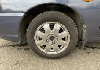 Подержанный автомобиль Kia Spectra Sedan 2006 года (12 фото)