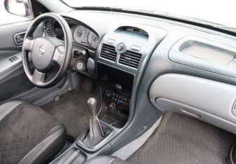Подержанный автомобиль Nissan Almera Classic 2007 года (10 фото)