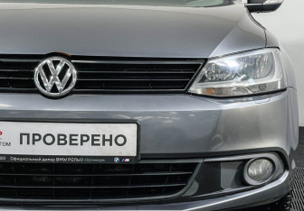 Подержанный автомобиль Volkswagen Jetta Sedan 2014 года (14 фото)