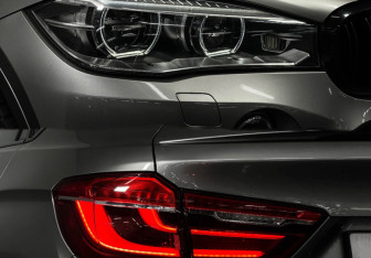 Подержанный автомобиль BMW X6 M 2015 года (22 фото)