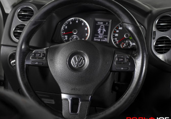 Подержанный автомобиль Volkswagen Tiguan 2014 года (13 фото)