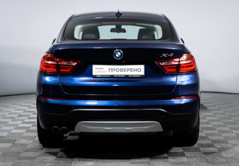 Подержанный автомобиль BMW X4 2016 года (6 фото)