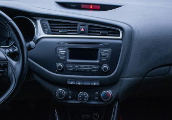 Подержанный автомобиль Kia Ceed Wagon 2015 года (14 фото)